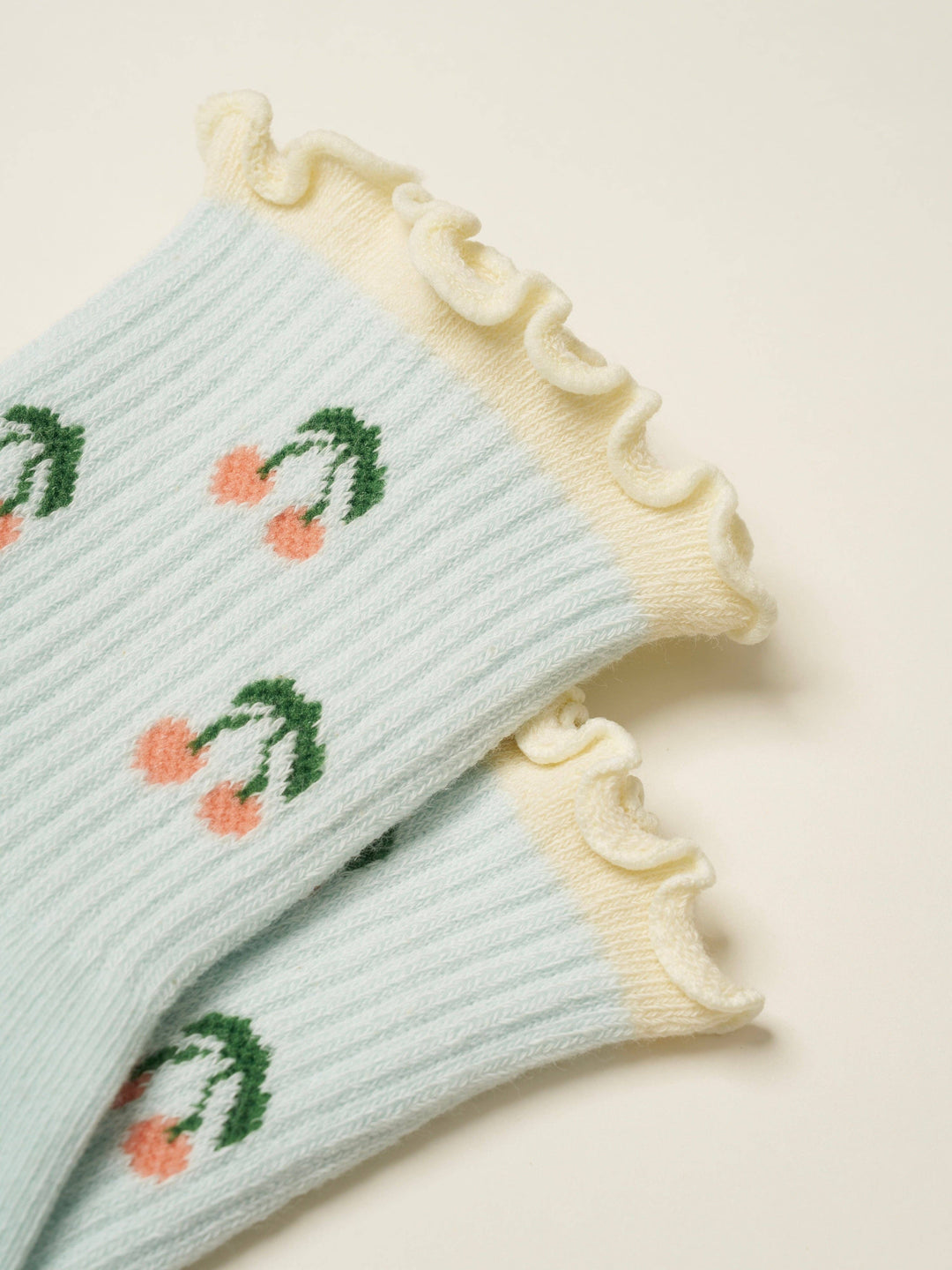 Cherry Ruffle Grip Sock: Baby Blue