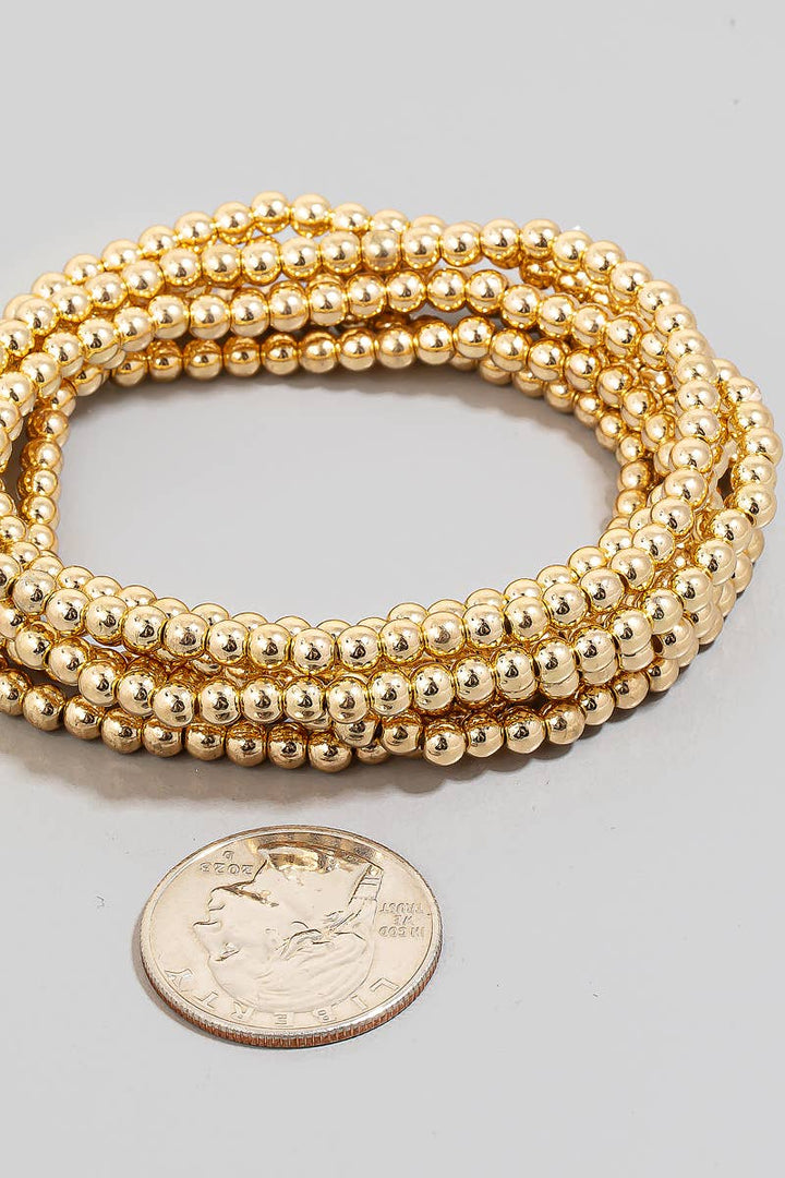 Seven Layered Mini Metallic Beaded Bracelet Set: Gold