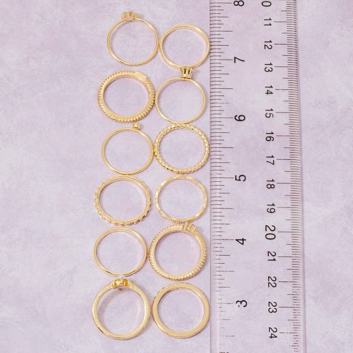 Twelve Piece Assorted Rhinestone Star Ring Set: Gold