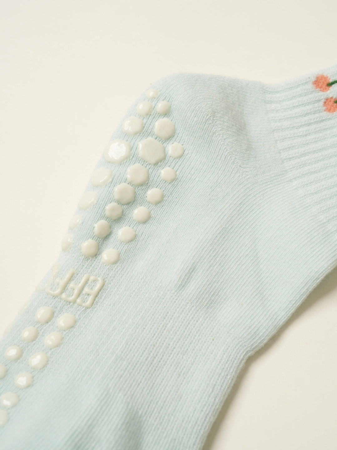 Cherry Ruffle Grip Sock: Baby Blue
