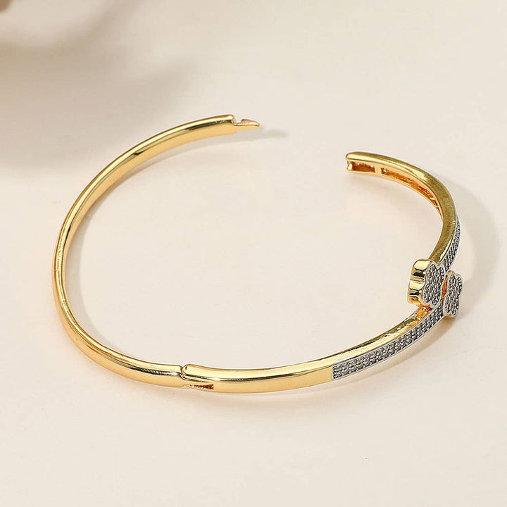 SECRET BOX_Stainless Steel Rhinestone Pave Quatrefoil Tip End Wrapped Hinged Bangle Bracelet