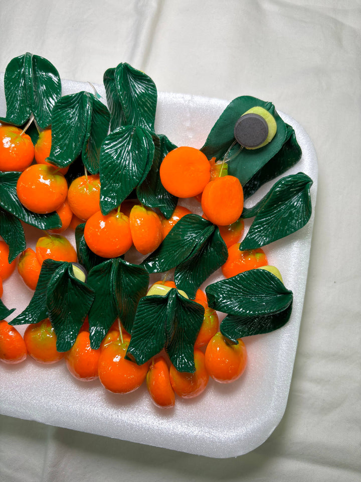 Hanging Oranges Kitchen Magnet