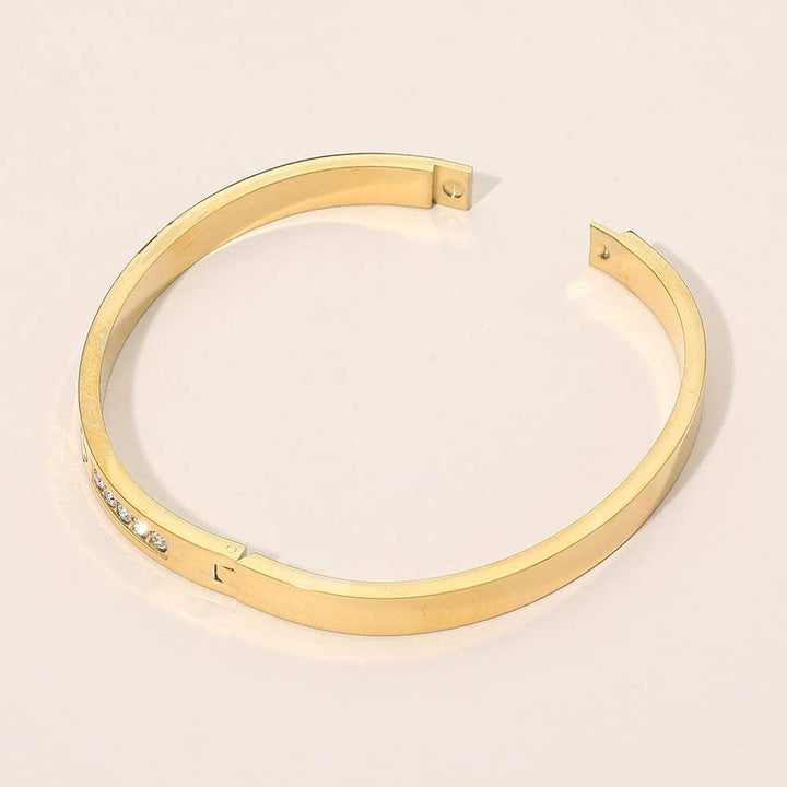 Stainless Steel CZ Accent Quatrefoil Engraved Hinged Bangle Bracelet: Silver